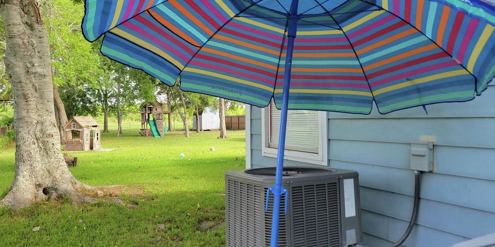 Een parasol boven een airco voor meer koeling en een lager verbruik?